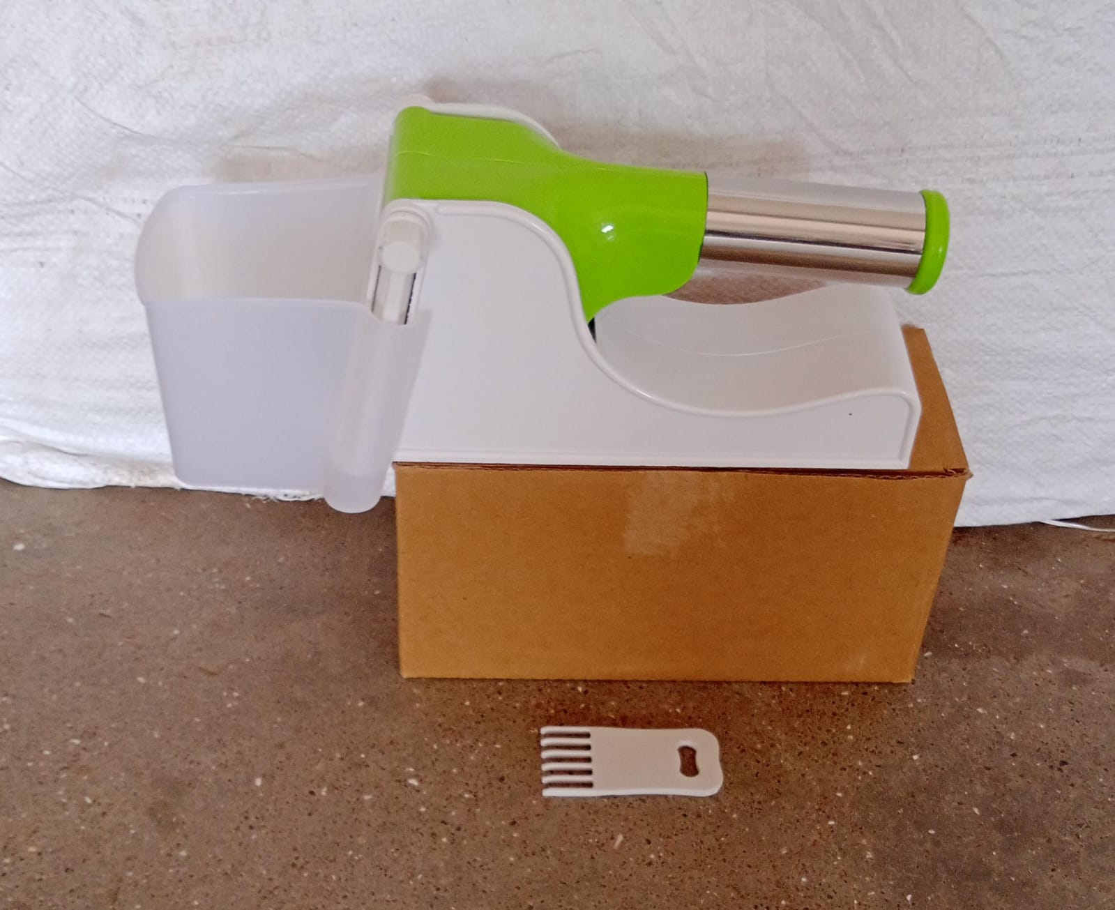 Plastic potato slicer with convenient container. Plastic potato slicer with convenient container.